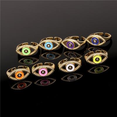 China Hiphop Hot Selling High Quality Copper Gold Plated Zircon Ring Woman Adjustable Ring Eye Shape Drop Oil for sale