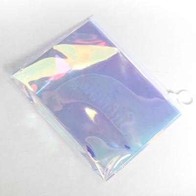 China New Design Ladies Laser Travel Bag MOQ100 PVC Laser Zipper Waterproof Bag Holographic Moisture Proof Makeup Bag for sale