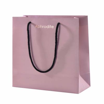 China Wholesale Recyclable Hot Stamping Gold Foil Logo Paper Bag New Design Custom Gift Paper Bags With Printing Logo Satin Handle for sale