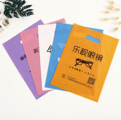 China Recyclable Wholesale Custom Colorful Printing Plastic Packaging Clothing Bag With Design Logo for sale