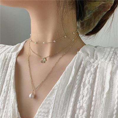 China FASHIONABLE Wholesale INS Summer Hot Sell Jewelry Scarf Pearl Gold Multilayer Butterfly Charming Necklaces Gifts For Women Girls for sale