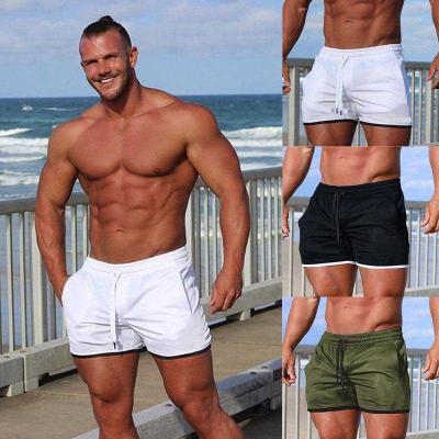 China Anti-Wrinkle Mens Workout Running Gym Shorts With Pockets Men's Knee Length Shorts Sporty Training Shorts Men for sale