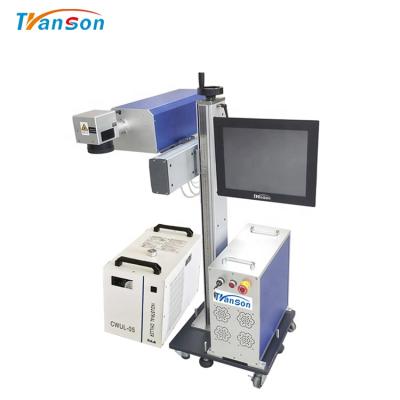 中国 355nm Wavelength Cold Laser Engraving 3W 5W UV Flying Laser Marking Machine Plastic Face Mask Glass UV Laser Engraver 販売のため