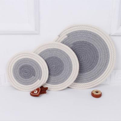 China Viable Wholesale High Quality Handwoven Polyester Cotton Place Mats Round Weave Table Mats Round for sale