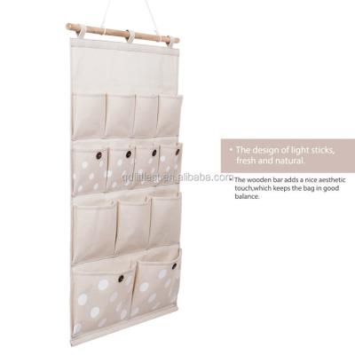 China Sustainable Wholesale Custom Natural Color Canvas 13 Hanging Wall Pocket Organizer for sale