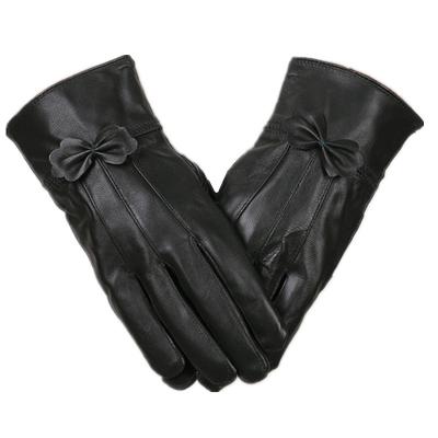 China Black Genuine Sheepskin Windproof Women Plain Fashion Winter Leather Gloves With Bow for sale