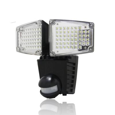 China Garden Automatic Motion Sensor Light Plastic Dual Head 100LED Solar Motion Security Light Automatic Motion Sensor Light for sale