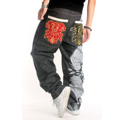 China QUICK DRY fashionable men's clothing straight-leg pants hip hop jeans graffiti printing loose embroidered skateboard pants for sale