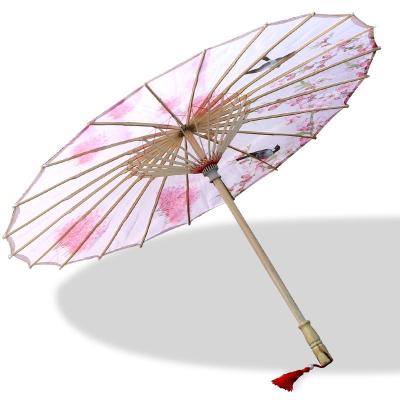 China Minimalist Japanese Chinese Bamboo Traditional Hand Craft Sun Parasol Wedding Handwork Pure Paraffin Oil Paper Umbrella for sale