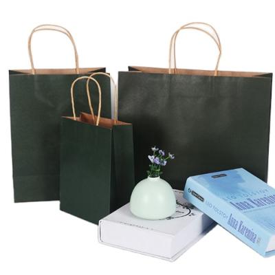 China Biodegradable Wholesale Custom Gift Craft Shopping Paper Bag With Handle for sale