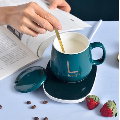 China Sustainable Hot Mug Gift Box Constant Temperature 55 Degree Mug With Lid Spoon Couple Trend Coffee Mug Desktop Artifact for sale