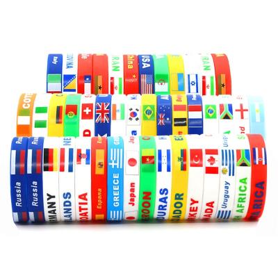 China Souvenir Sports Competition Flag Silicone Wristband Logo Custom Men's Rubber Bracelets for sale