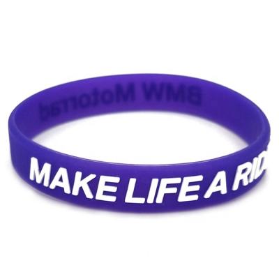 China Cheap keepsake custom debossed colorfilled in custom silicone wristband for sale