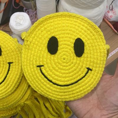 China Cute Convenient High Quality Crochet With Hand - Round Messenger Bag Large Capacity Woven Yellow Smile Size Round Face Bag for sale