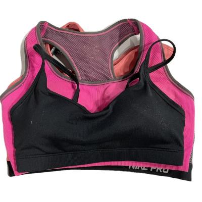 China Sports designer used clothing packs branded ladies sports bra for sale