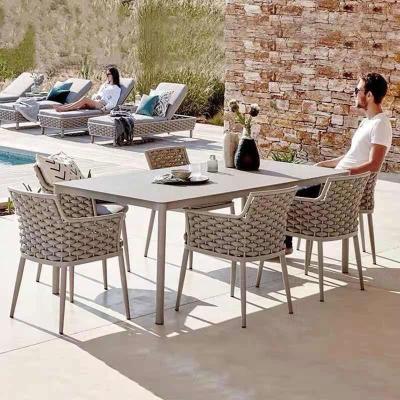 China Modern Outdoor Waterproof Rattan Wooden Leisure Table and Dining Table Courtyard Garden Dining Table Balcony Living Room Chair Set Rope Furniture for sale