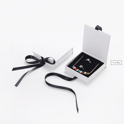 China Luxury Recyclable Ring And Pendant White Jewelry Gift Box With Ribbon Closure Bow for sale