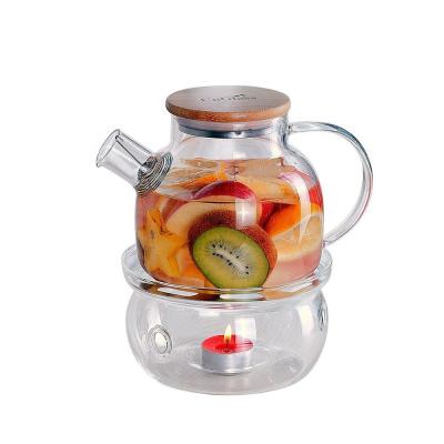 China Morden Luxury Glass Teapot 900ml Borosilicate Glass Water Jug With Bamboo Lid -20C-150C for sale