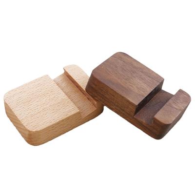 China Various Universal Handwork Good Quality Portable Multifunctional Mobile Phone Wooden Bracket for sale