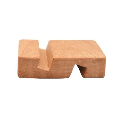 China Special Hot Selling Creative Handwork Solid Wood Mobile Phone Bracket Mini Lazy Bracket for sale