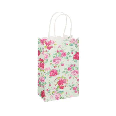 China Recyclable Custom Reusable Floral Logo Gift Portable Shopping Paper Bag for sale