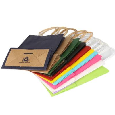 China Multicolor and multi-size recyclable portable paper packaging bag with handle for sale