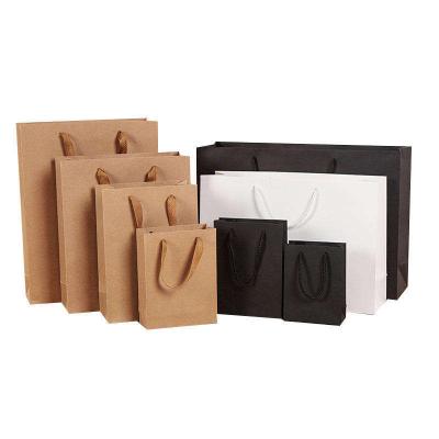 China Custom Wholesale Recycled Materials Kraft Foldable Paper Shopping Bag With Your Own Logo for sale