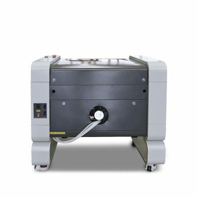 China Water Cooled 100w CO2 Laser Engraver Carving Machine for sale