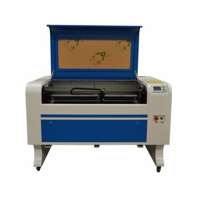 China 9060/1080/1310 60/80/100/130/150W Ruida Controller Water Cooled Passthrough Co 2 Laser Engraving Machine for sale