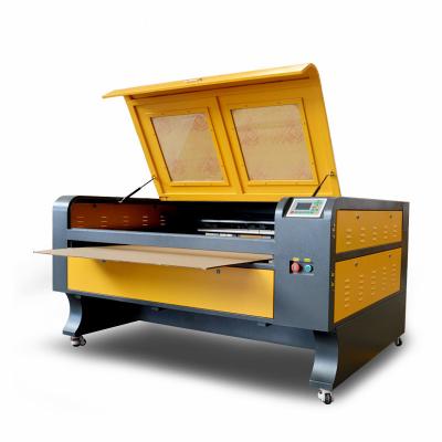 China 1390/1310 Water Cooled Pass Through 60/80/100/130/150w CO2 Laser Engraving Cutting Machine for sale