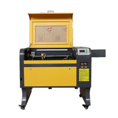 China Laser Engraving 4060 Model Engraving And 50w M2 CO2 Laser Cutting Machine / Ruida Cotroller for sale