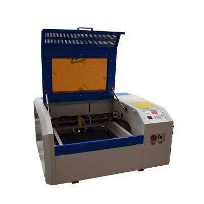 China Laser Engraving 4040 50watt Co2 M2/Ruida Laser Engraving Cutting Machine for sale