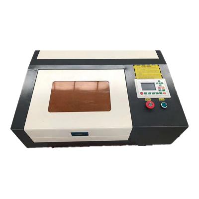 China Laser Engraving 3020 40w CO2 Laser Engraving Machine for sale