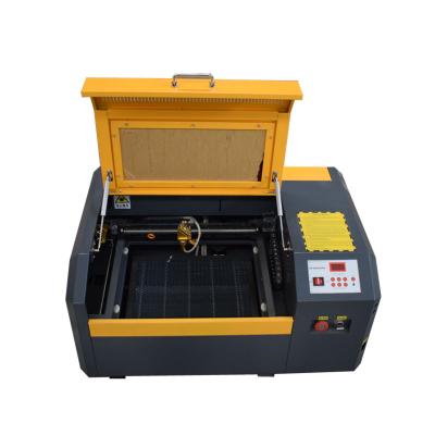 China Laser Engraving 50w CO2 Laser Engraver Machine 4040 Laser Cutting Machine for sale