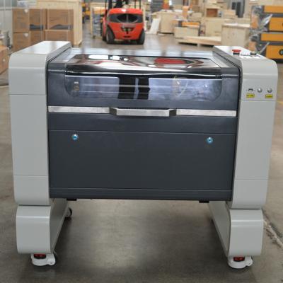 China CO2 4060 100w Water Cooled Laser Engraving Cutting Machine for sale