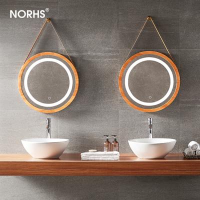 China Most Product Touch Switch Wall Hanging Illuminated Round Wood Framed Led Bathroom Decoration Mirror for sale