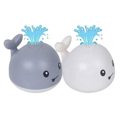 China Cognitive Floating Toy LED Lighted Bathtub Shower Swimming Pool Water Spray Whale Baby Bath Toy for sale