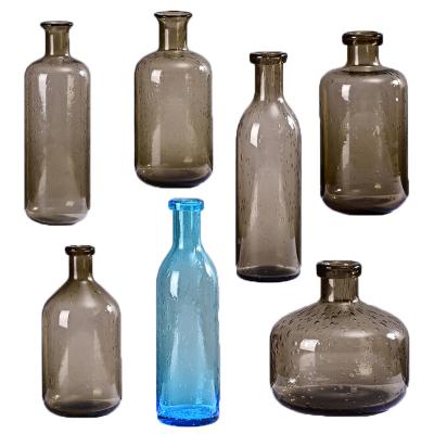 China Modern Hand-blown Custom Modern transparent Home Decor glass creative bubble vase Flowers Glass Vases   accessories photography props for sale