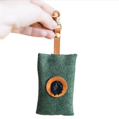 China Sustainable Portable Dog Poop Bag Dispenser Handle Outdoor Waste Bins Cleaning Products for sale