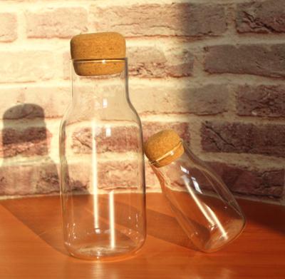 China Wholesale Viable Borosilicate Glass 730ml Blown Mouth Water Bottle With Cork Lid For Home Use for sale