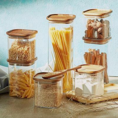 China Sustainable Hot Sales Hand Made Stackable Glass Storage Jar Set With Bamboo Lid for sale