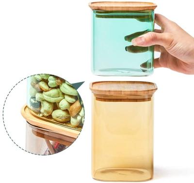 China Sustainable Best Seller Colored Stackable Glass Storage Jar With Bamboo Lid for sale