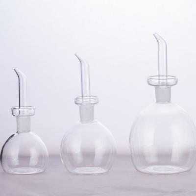 China Sustainable Hot Selling Ball Shape Salad Dressing Glass Bottles for sale