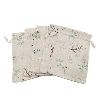 China Flower Designs Recyclable Gift Bag With Drawstring Printed Delicate Cotton Canvas Sack Gift Packaging Bag For Jewelry Wedding Party Favors for sale