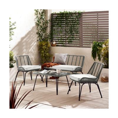 China Metal Frame Garden Set 4 Seating Balcony Furniture Plastic Rattan Patio Furniture for sale