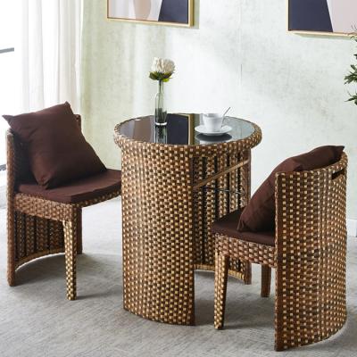 China Rattan gehärtetes Glas rundes Esstisch und Stuhl Set für Kaffeehaus modernes Design zu verkaufen