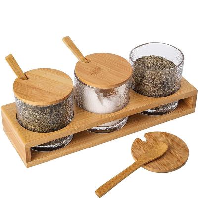 China Multifunctional Home Kitchen Spice Jar Tabletop Racks Viable Set Glass Spice Jars Bamboo Spice Jars Set With Spoon for sale