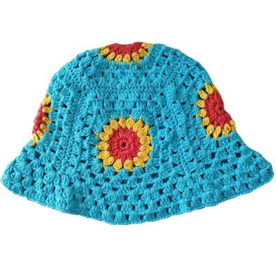 China Fashion custom hand knitted professional sunflower jacquard hollow sun protection beanies orange wool hat manufacturers outdoor for sale