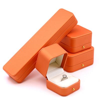 China High Quality Manufacturer Custom Packaging Orange Color Jewelry Box Luxury With Logo PU Leather Ring Boxes For Jewelry Box for sale