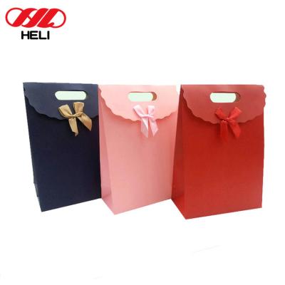 China Heli China Manufacture Cheap Customized Disposable Gift Pink Paper Bag for sale